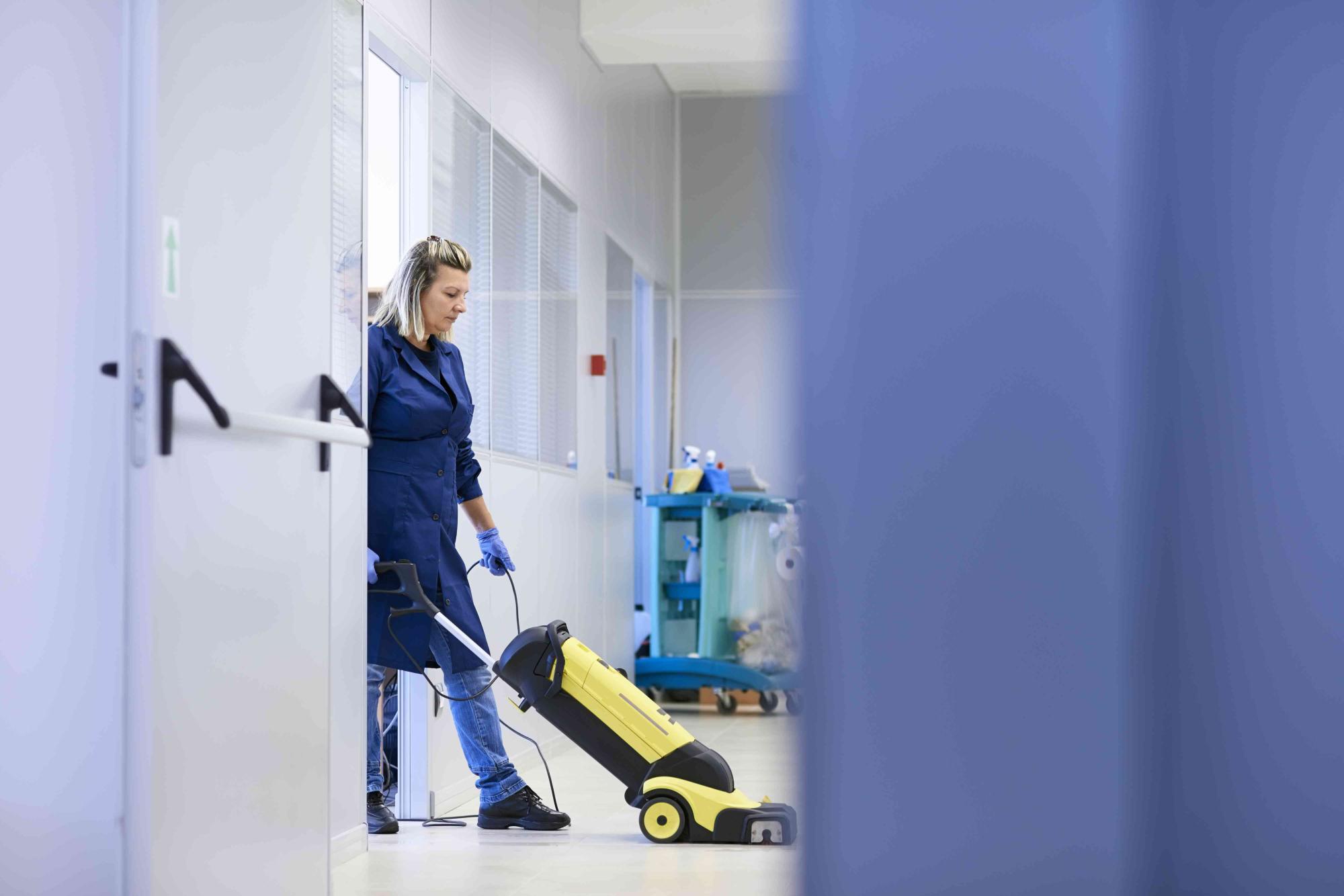 Women At Workplace, Professional Female Cleaner Washing Floor In