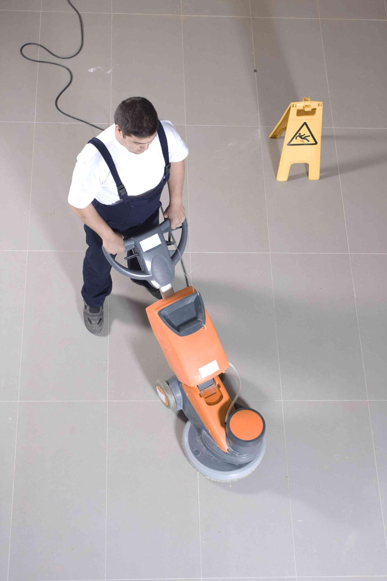cleaning floor with machine
